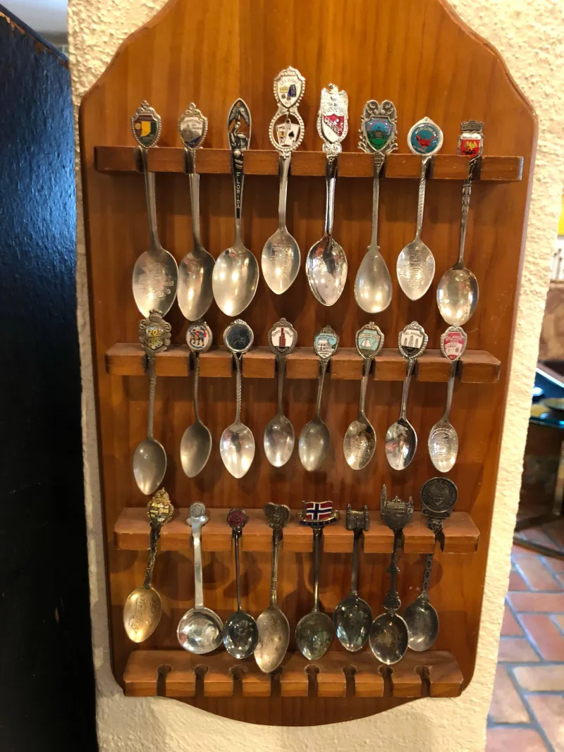 Nobody Buys a Souvenir Spoon to Impress Anyone — Which Is Exactly Why It's the Most Honest Thing in Your Drawer
